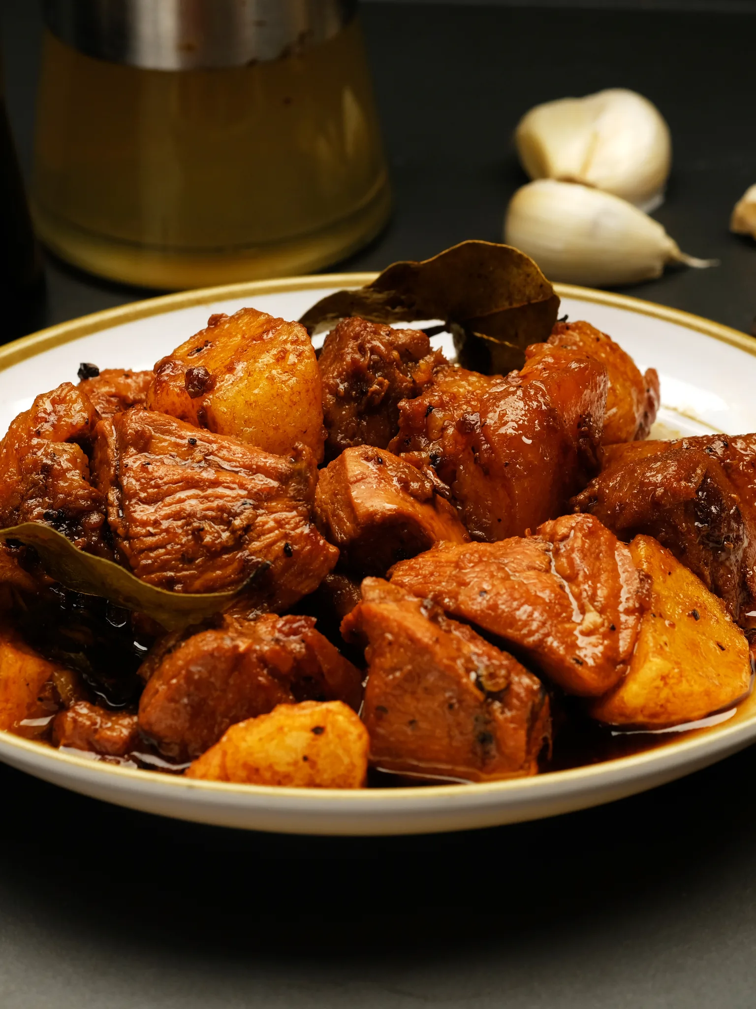 Filipino adobo: It is a dish composed of pork slices cooked in soy sauce, vinegar, and garlic