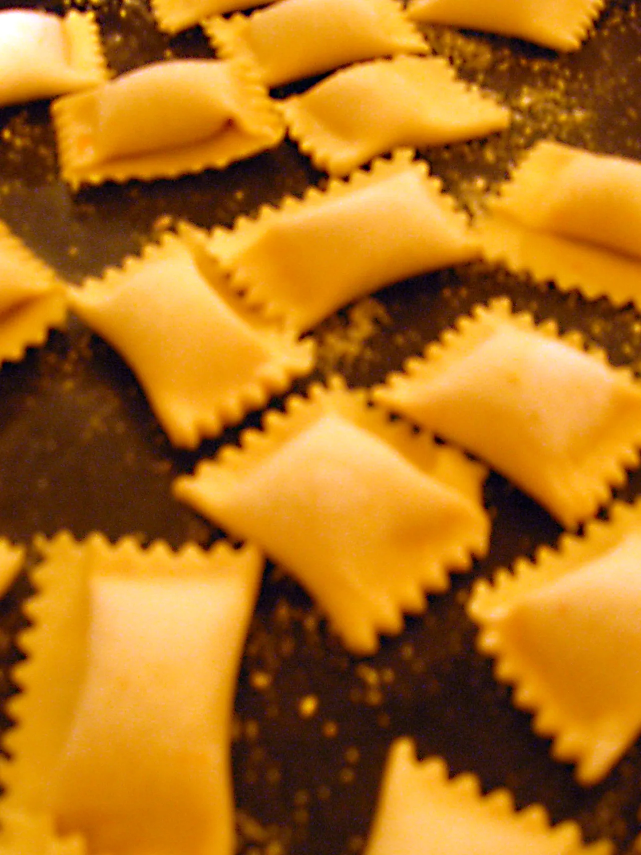 agnolotti: Image of agnolloti on a baking sheet. Made according to the instructions in Thomas Keller's "French Laundry Cookbook."