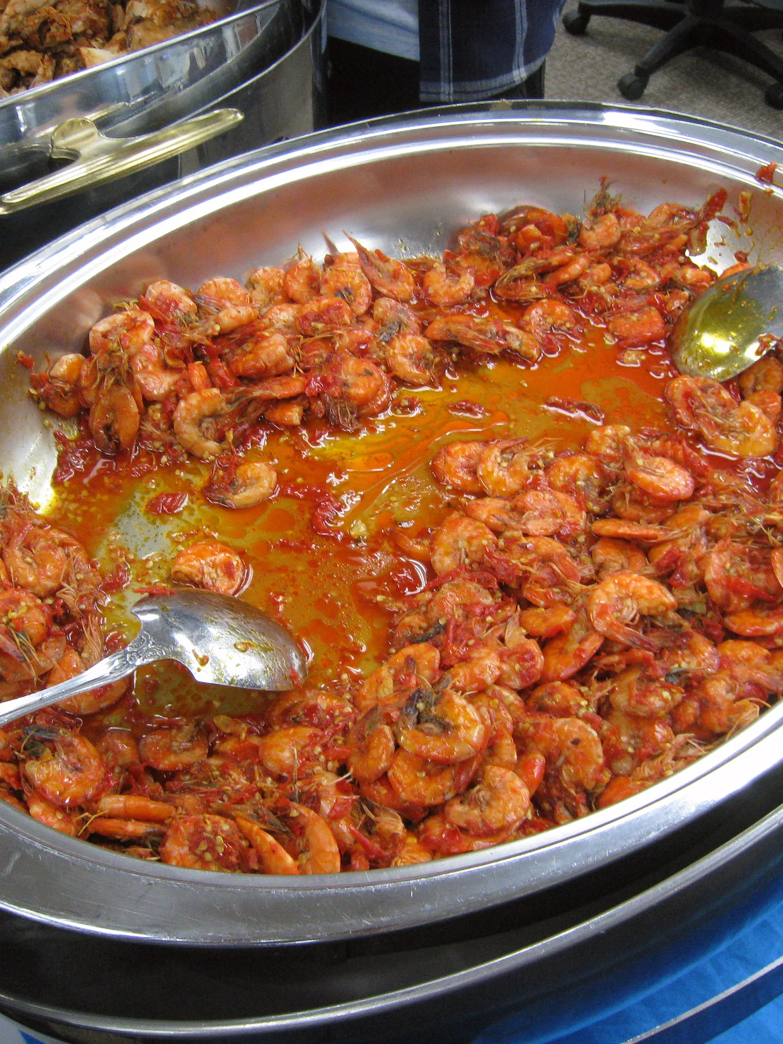 balado: Udang balado, shrimp in spicy balado (chili pepper sauce). A popular Minang (Padang) dish served in a prasmanan (buffet) in Jakarta, Indonesia