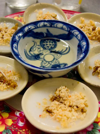 bánh bèo: Glutinous rice, meat, ground peanuts, fish sauce