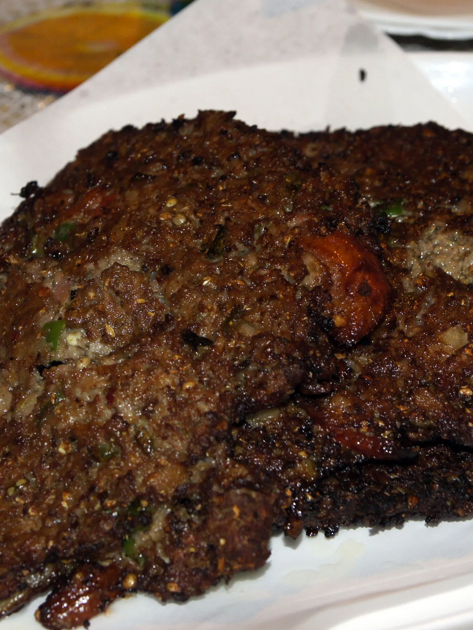 chapli kebab: Chapli Kebab served in a Birmingham Balti restaurant