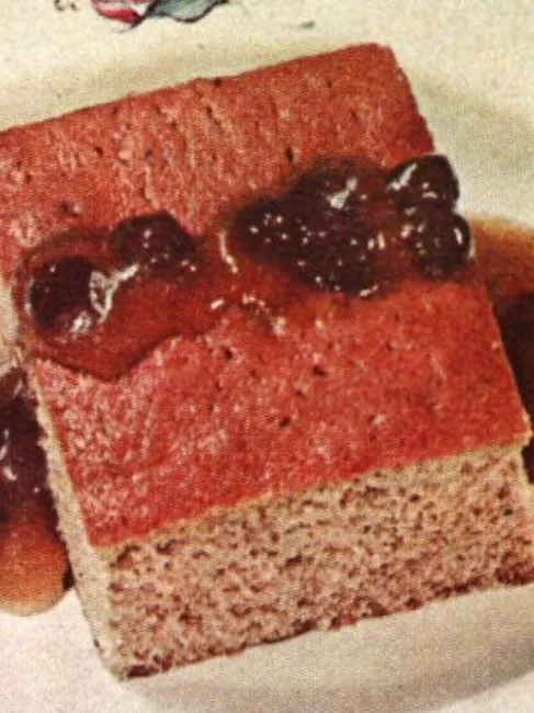 Cottage Pudding: Cottage pudding in a 1930s magazine flavored with spices and molasses, served with a raisin sauce