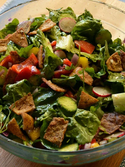 Fattoush: Fattoush salad mixed with leafy greens