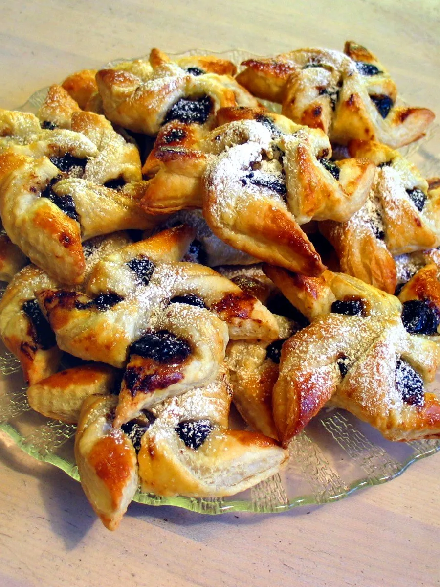 joulutorttu: Finnish Christmas pastries filled with prune marmalade and topped with powdered sugar