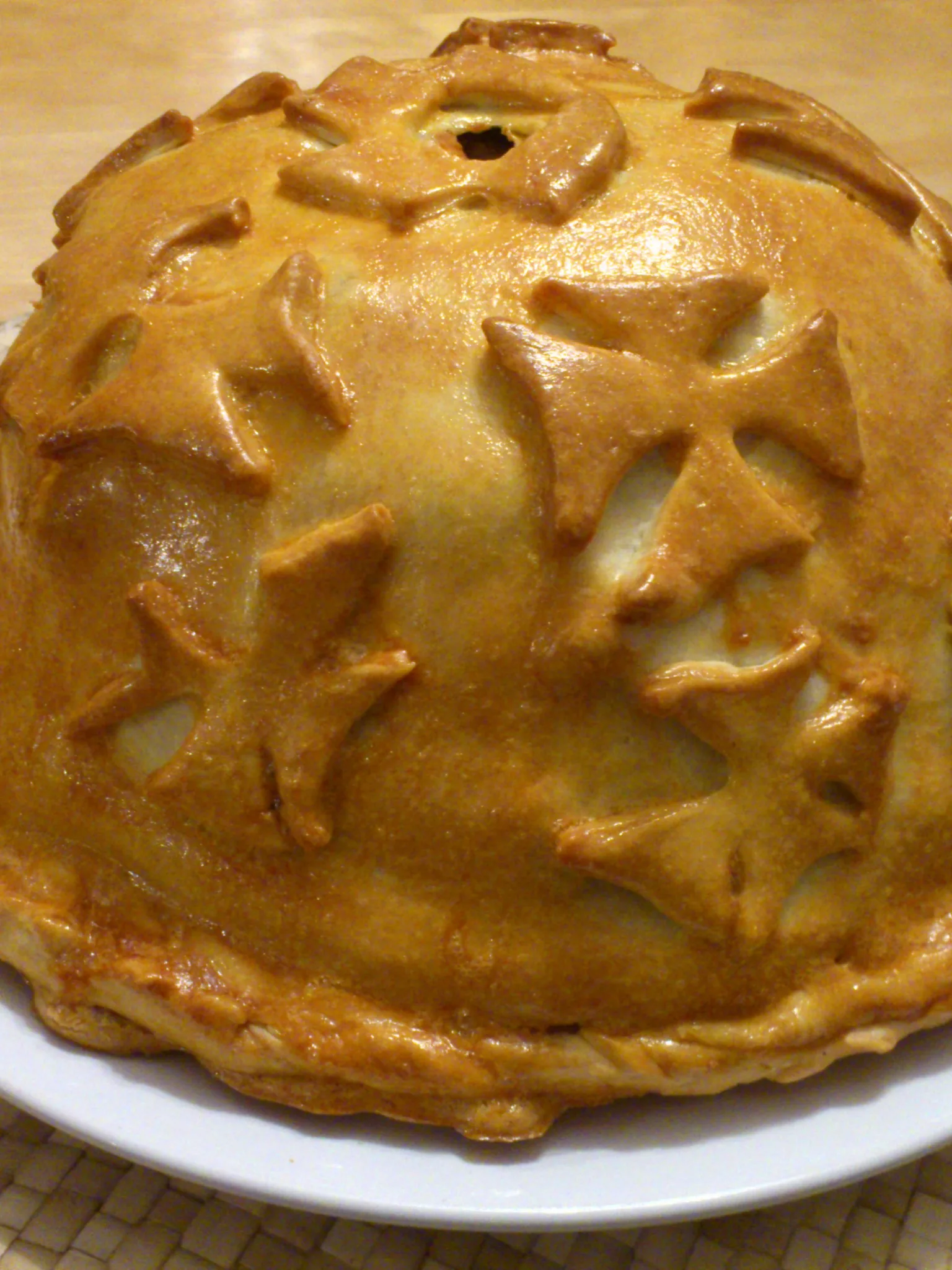 Kurnik: Kurnik, tradional big russian pie for celebration table. Filled with slices of chicken, mushrooms, blini, rice, eggs