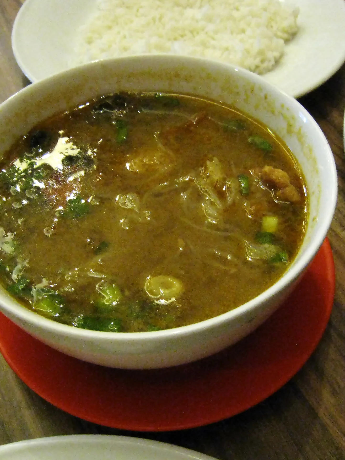 Sop saudara: Sop Saudara, a Makassar-Bugis cuisine spicy beef soup, sometimes added with offals. A specialty of Makassar city, Indonesia