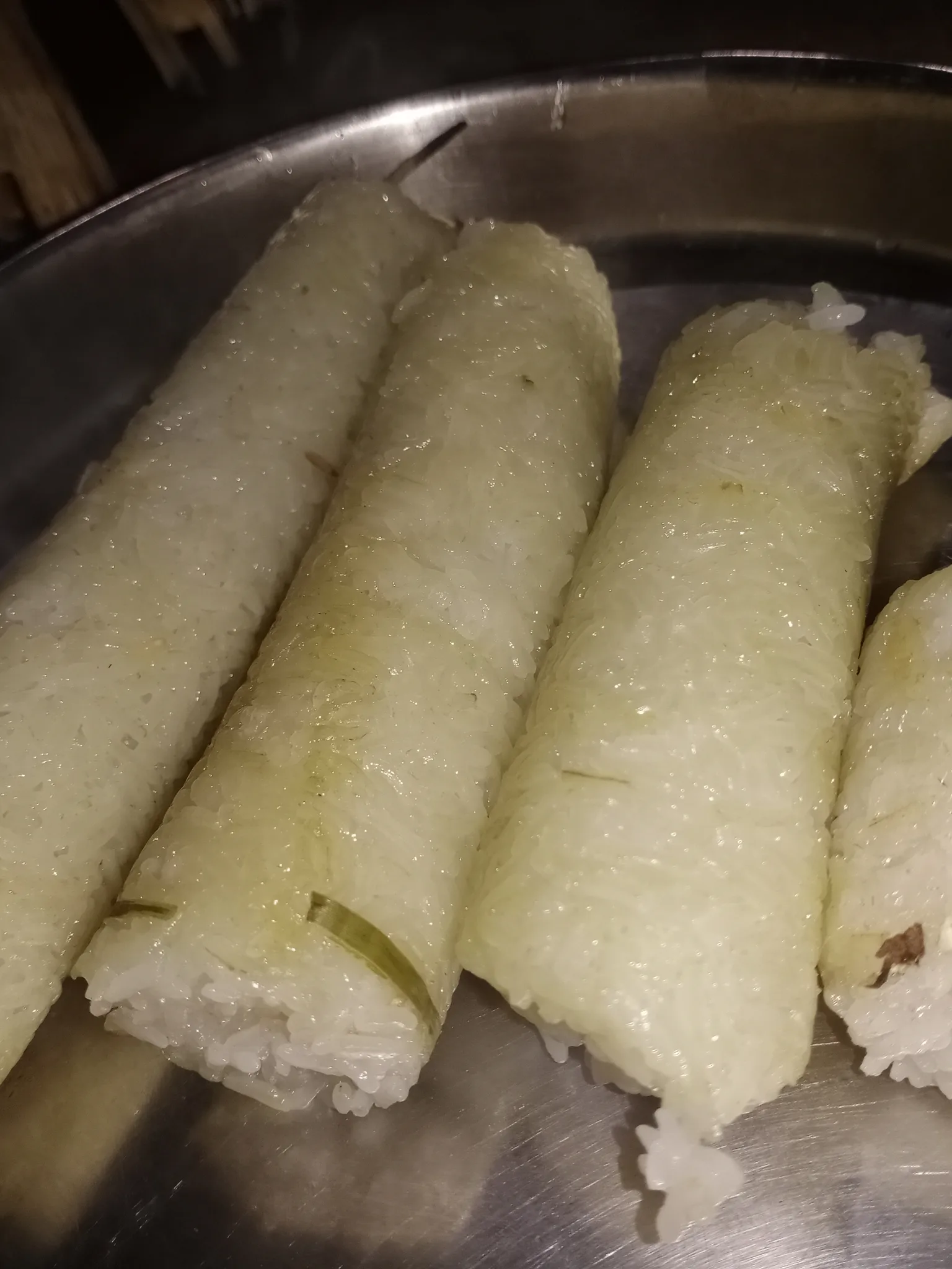 Chunga Pitha: Rice cooked in bamboo pipe. It's a typical assamese glutinouse rice dish named Chunga chaul