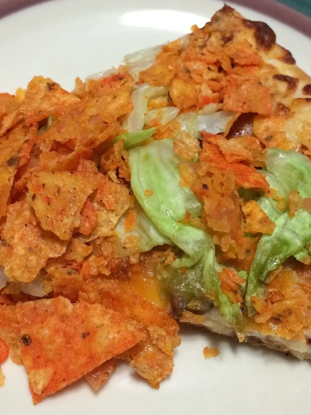 Taco pizza: Taco pizza as served at the Midwest United States gas station chain Casey's General Store. The image has been cropped to focus on the pizza