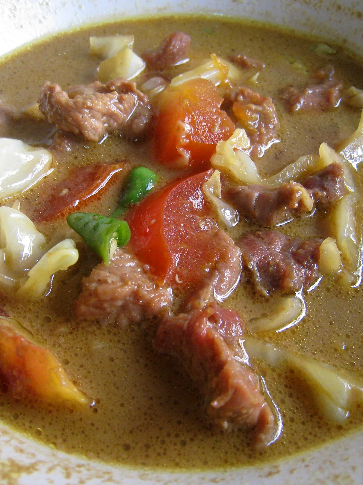 tongseng: Tongseng, a Javanese spicy and rather sweet goat meat soup. Specialty of Solo (Surakarta), Central Java, Indonesia