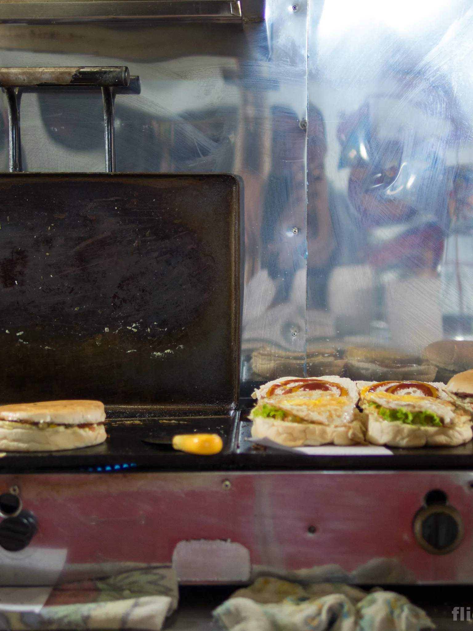Xis: Brazilian xis sandwich being prepared