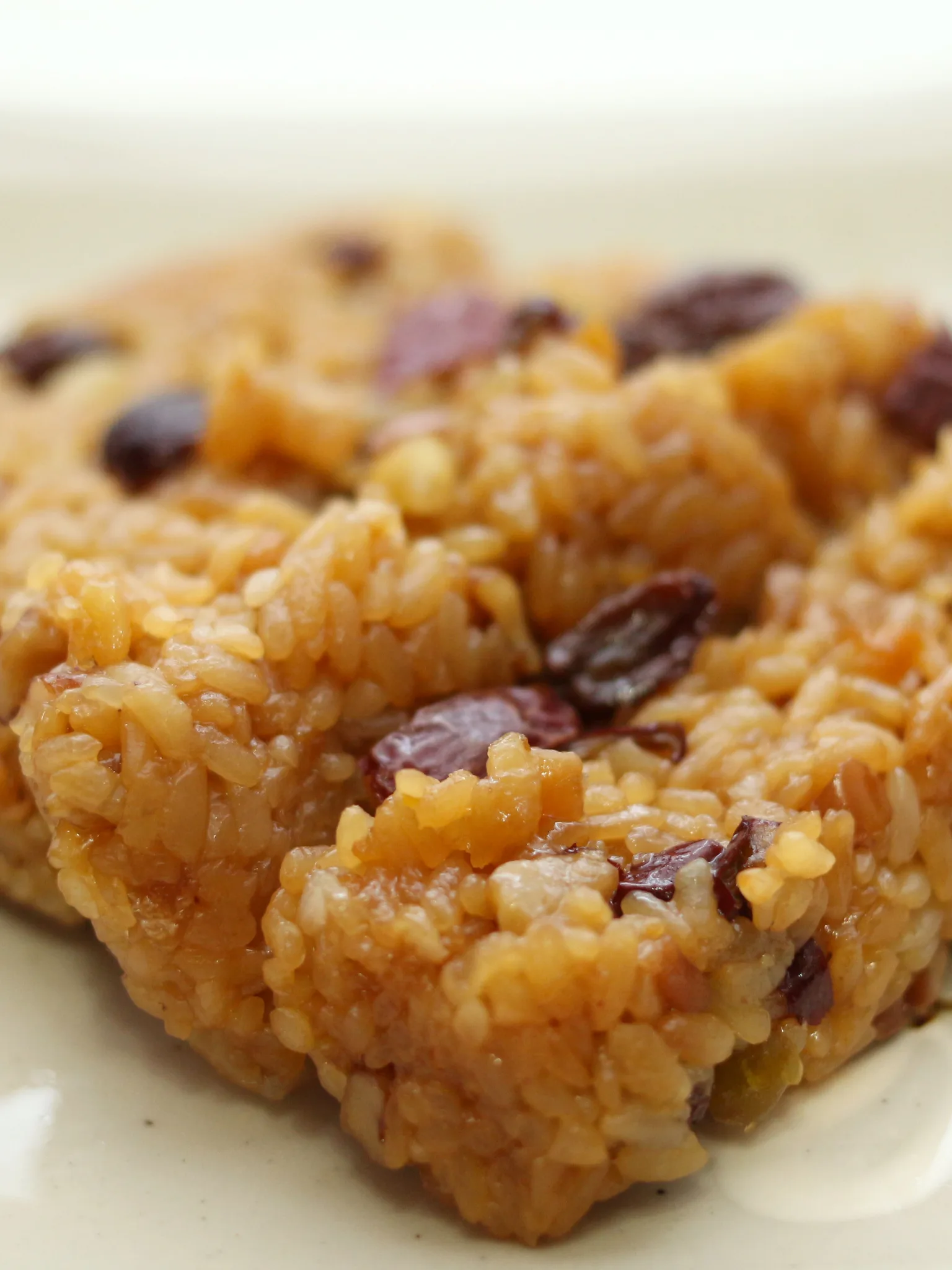 yaksik: Sweet rice with nuts and jujubes, a Korean dish made by steaming glutinous rice mixed with honey, sugar, jujubes, soy sauce, sesame oil, chestnuts, pine nuts, etc